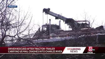 Crash into Charles: Driver rescued after tractor-trailer carrying US mail ends up in river