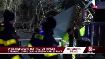 Crash into Charles: Driver rescued after tractor-trailer carrying US mail ends up in river