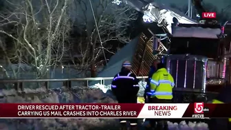 Crash into Charles: Driver rescued after tractor-trailer carrying US mail ends up in river