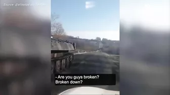 Ukrainian taunts Russian soldiers in broken down tank