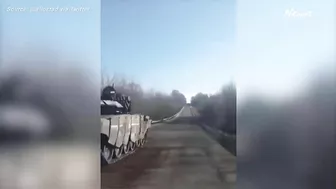 Ukrainian taunts Russian soldiers in broken down tank