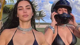 Kim Kardashian sizzles in skimpy black bikini top and motorcycle helmet