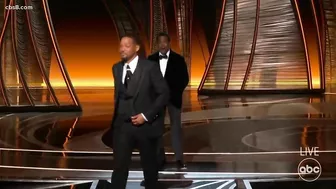 Will Smith hits Chris Rock on Oscars stage after joke about Jada Pinkett-Smith