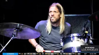 Locals, Foo Fighters fans gather to honor Taylor Hawkins with drum circle in Long Beach