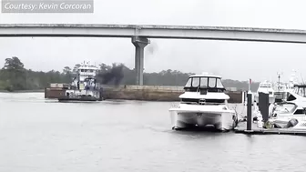 Caught on Camera: Runaway barge has close encounter with Orange Beach toll bridge