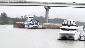 Caught on Camera: Runaway barge has close encounter with Orange Beach toll bridge