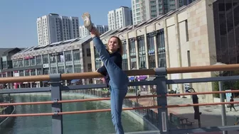 Stretching near river on the bridge