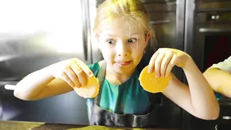 Diana and Roma play outdoor games with their mom and help mom cook food