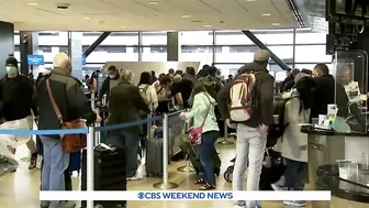 Holiday weekend travel surges amid airline staffing shortages