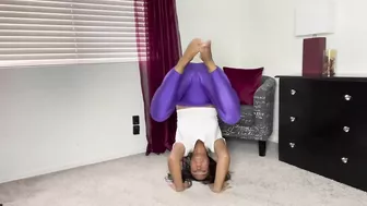 Stretching in shiny purple tights