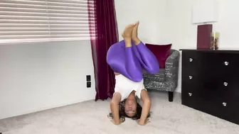 Stretching in shiny purple tights