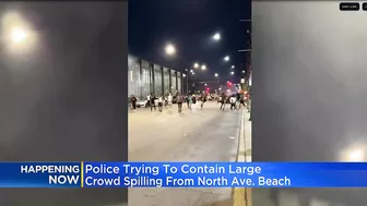 Police try to contain crowd that spilled over from North Avenue Beach