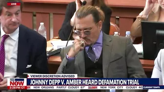 Johnny depp's lawyer steals his candy in court... (funny)