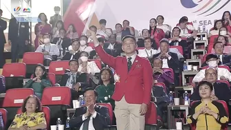 Team Singapore makes its entrance at the 31st SEA Games opening ceremony in Hanoi