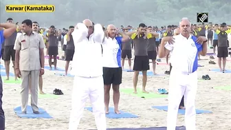 Rajnath Singh takes part in Yoga session with Indian Navy personnel at Karwar Naval Base