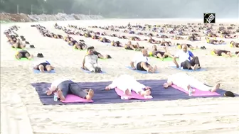 Rajnath Singh takes part in Yoga session with Indian Navy personnel at Karwar Naval Base