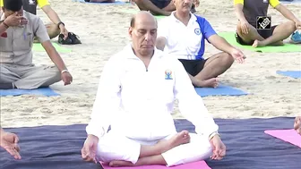 Rajnath Singh takes part in Yoga session with Indian Navy personnel at Karwar Naval Base