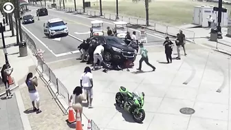 Onlookers and police band together to save motorcyclist trapped underneath car in Myrtle Beach