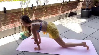 Yoga stretching by the pool