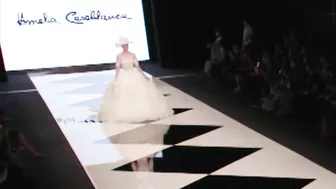 Model FALLS in wedding dress during Amelia Casablanca Bridal Couture Spring/Summer 2022 Fashion Show