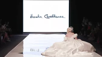 Model FALLS in wedding dress during Amelia Casablanca Bridal Couture Spring/Summer 2022 Fashion Show