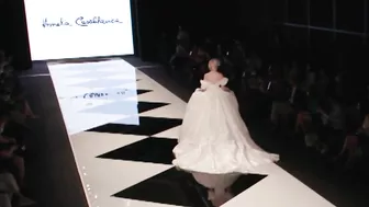 Model FALLS in wedding dress during Amelia Casablanca Bridal Couture Spring/Summer 2022 Fashion Show