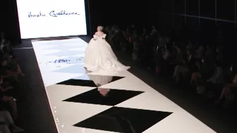 Model FALLS in wedding dress during Amelia Casablanca Bridal Couture Spring/Summer 2022 Fashion Show