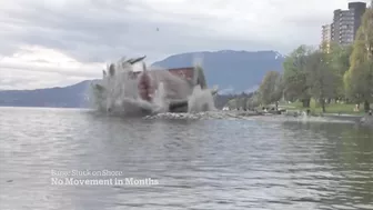 Barge beached in Vancouver’s English Bay not budging