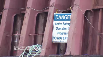 Barge beached in Vancouver’s English Bay not budging