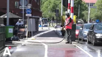 Zomer in Amsterdam: lachend bruggen natspuiten van 9 tot 5