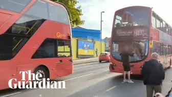 Man blocks bus in east London as travel frustration builds amid rail strike