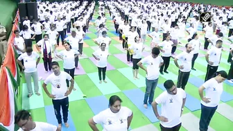 International Yoga Day: CM Kejriwal, Manish Sisodia perform Yoga at Thyagaraj Stadium