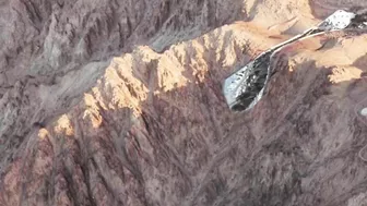 Mars perseverance rover capture A stream in the middle of the high mountains of Mars' surface