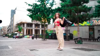 Fashion Model catwalk in slow motion red outfit