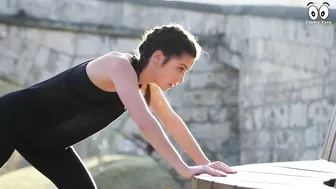 Woman stretching near a swimming pool | Push-ups on a park bench | workout