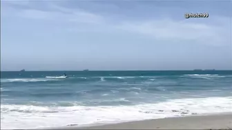 Watch: Beachgoers capture small plane crash in ocean at Huntington Beach