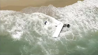 Watch: Beachgoers capture small plane crash in ocean at Huntington Beach