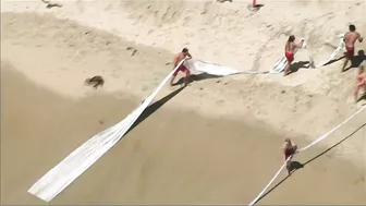 Watch: Beachgoers capture small plane crash in ocean at Huntington Beach