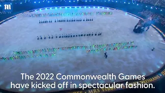 Prince Charles and Camilla pull up to the Commonwealth Games in style during Opening Ceremony