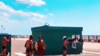 The Passage Of An Helicopter "Alligator" Over A Beach In Krim.