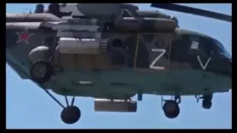 The Passage Of A Russia’s Helicopters Over A Beach Low Altitude