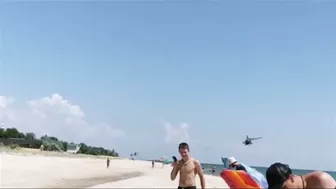 The Passage Of A Russia’s Helicopters Over A Beach Low Altitude