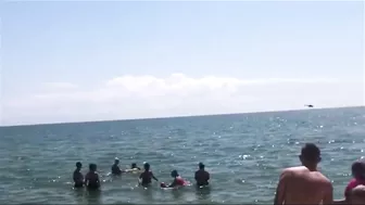 The Passage Of A Russia’s Helicopters Over A Beach Low Altitude