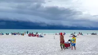 VIDEO: Dark storm clouds rolling in on Florida beach