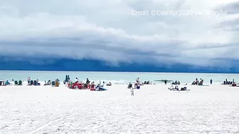 VIDEO: Dark storm clouds rolling in on Florida beach