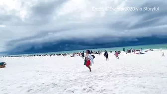 VIDEO: Dark storm clouds rolling in on Florida beach