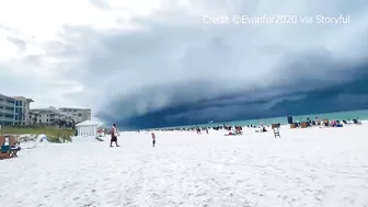 VIDEO: Dark storm clouds rolling in on Florida beach