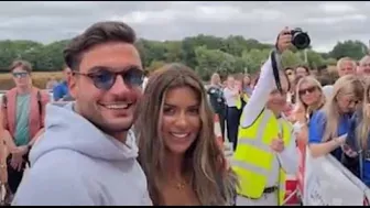 Ekin Su and Davide greeting fans at the airport on Instagram live after love island