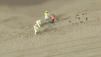 Surfers Catch Huntington Beach Waves Despite Oil Spill