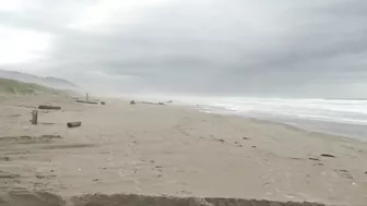 Capsized sailboat removed from shore near Rockaway Beach